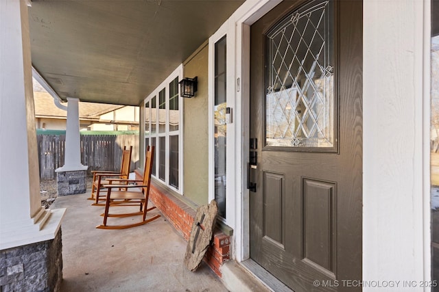 property entrance with a porch