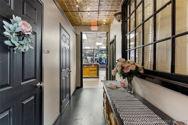 corridor with dark wood-type flooring