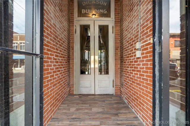 view of exterior entry featuring french doors