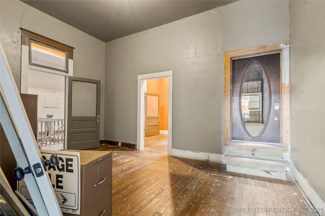 foyer with hardwood / wood-style flooring