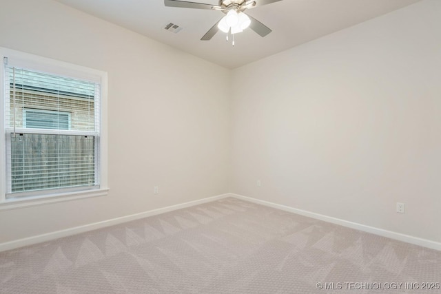 5809 E 126th Pl S, Tulsa, OK 74008 - empty room with baseboards, light carpet, and a ceiling fan