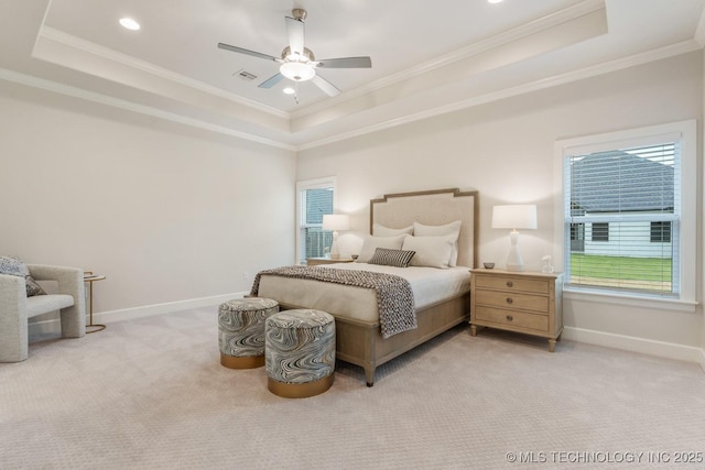 5809 E 126th Pl S, Tulsa, OK 74008 - bedroom featuring a tray ceiling, crown molding, light colored carpet, multiple windows, and baseboards