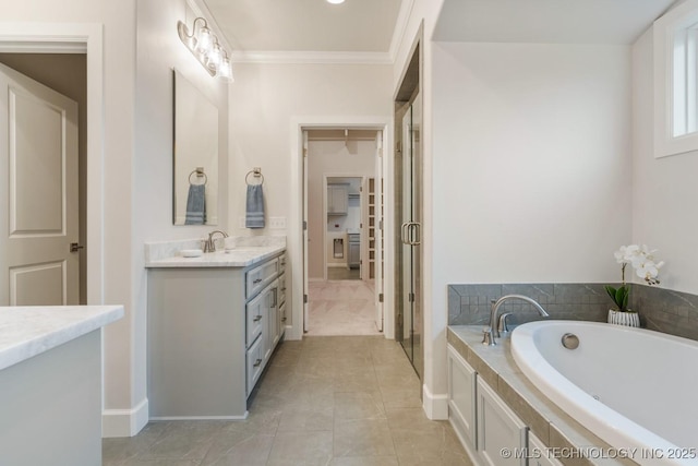 5809 E 126th Pl S, Tulsa, OK 74008 - bathroom featuring a bath, vanity, crown molding, baseboards, and tile patterned flooring