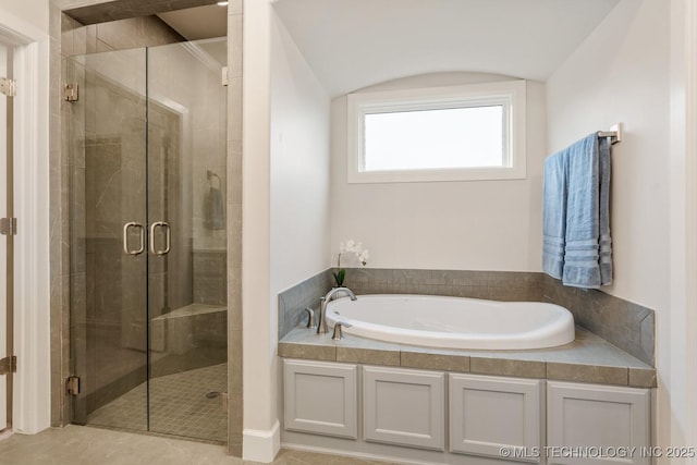 5809 E 126th Pl S, Tulsa, OK 74008 - full bathroom featuring a stall shower, a garden tub, and tile patterned flooring