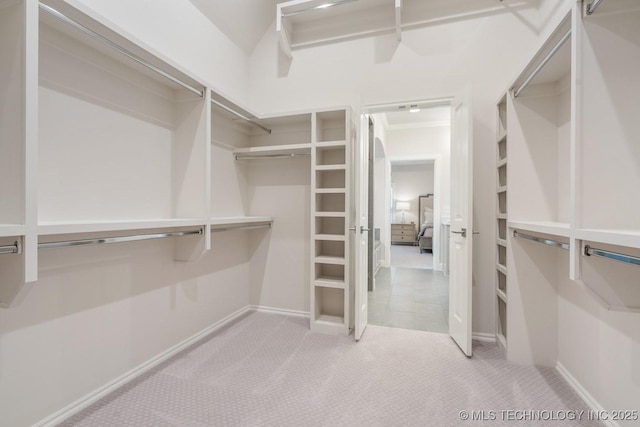 5809 E 126th Pl S, Tulsa, OK 74008 - walk in closet with carpet floors