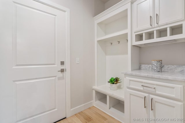 5809 E 126th Pl S, Tulsa, OK 74008 - mudroom featuring light wood finished floors and baseboards