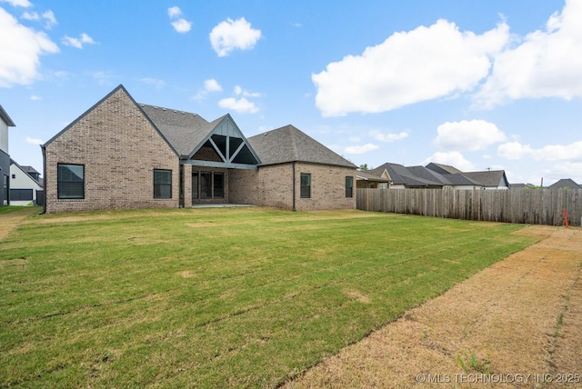5809 E 126th Pl S, Tulsa, OK 74008 - rear view of house featuring brick siding