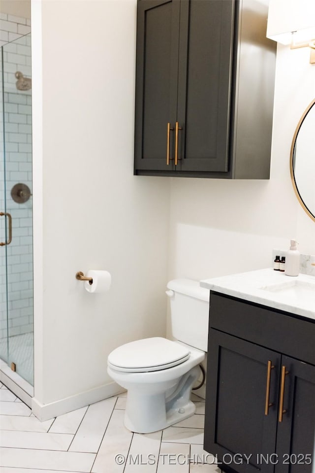 bathroom featuring a shower with door, tile patterned flooring, vanity, and toilet