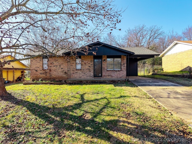 single story home featuring a carport and a front yard