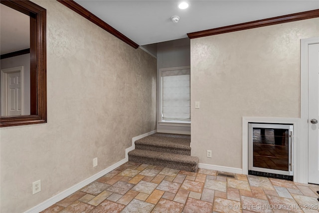 stairway with crown molding