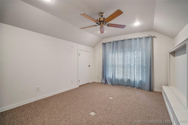 bonus room featuring lofted ceiling, ceiling fan, and carpet