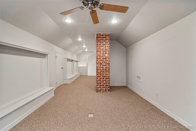 bonus room with ceiling fan, light carpet, and lofted ceiling