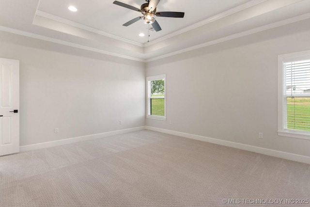 223 W 172nd St S, Mounds, OK 74047 - unfurnished room with a tray ceiling, light colored carpet, ornamental molding, plenty of natural light, and recessed lighting