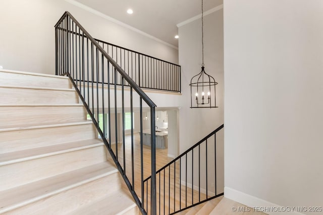 223 W 172nd St S, Mounds, OK 74047 - stairs with a chandelier, ornamental molding, wood finished floors, and recessed lighting