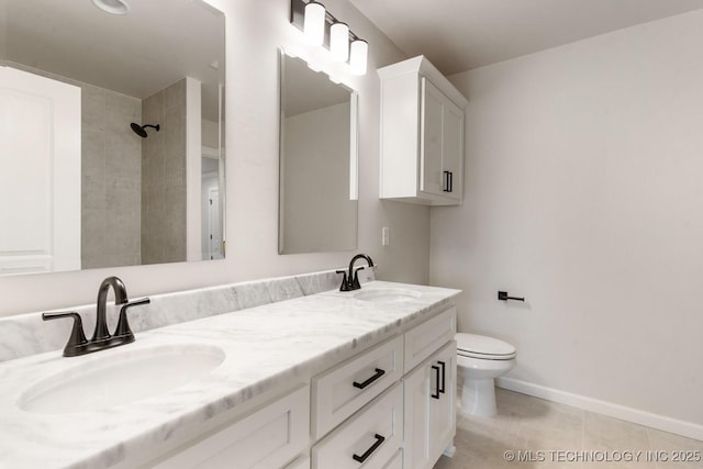 223 W 172nd St S, Mounds, OK 74047 - bathroom featuring double vanity, tile patterned floors, and a tile shower