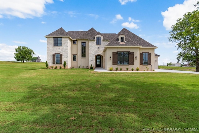 223 W 172nd St S, Mounds, OK 74047 - french country inspired facade with stone siding, a front yard, and stucco siding