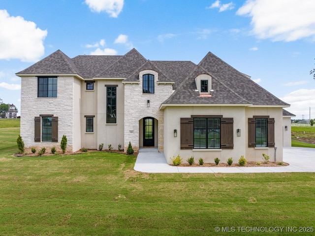223 W 172nd St S, Mounds, OK 74047 - french provincial home featuring stone siding, roof with shingles, a front lawn, and stucco siding