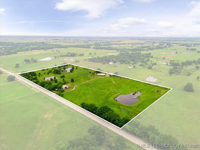 bird's eye view featuring a rural view and a water view