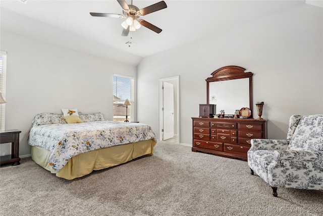 bedroom featuring lofted ceiling, ceiling fan, and carpet flooring