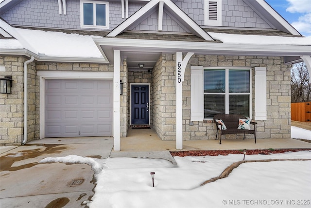 view of front of home with a garage