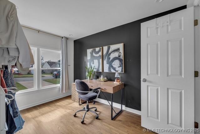 home office featuring light hardwood / wood-style floors