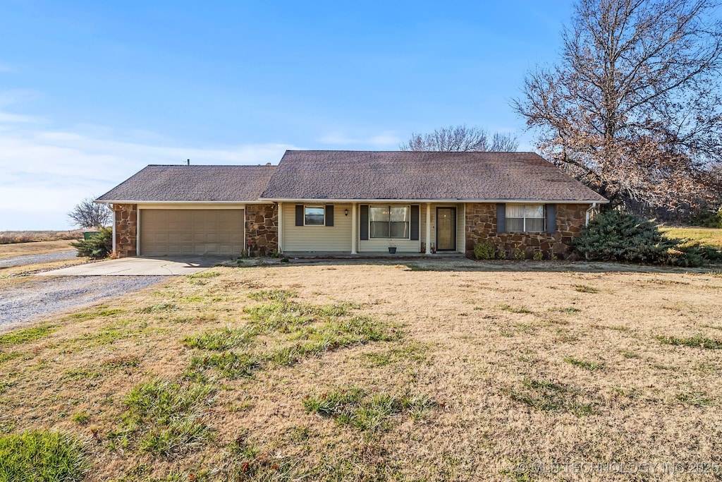 single story home with a garage