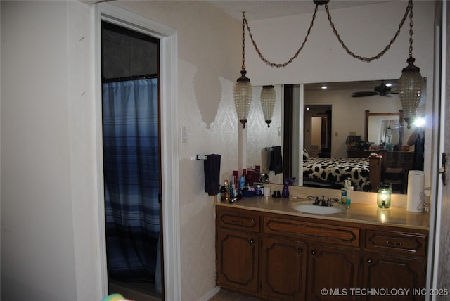 bathroom with vanity and ceiling fan