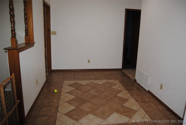 view of tiled empty room