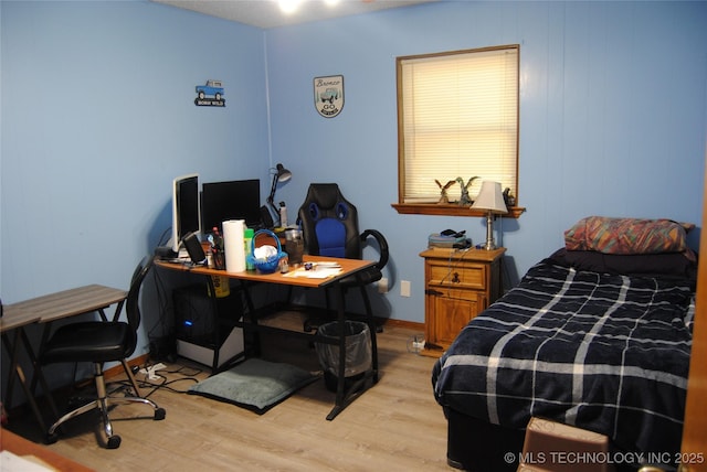 bedroom featuring light wood-type flooring