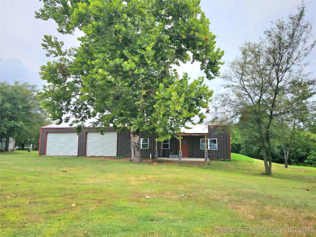 view of yard with covered porch