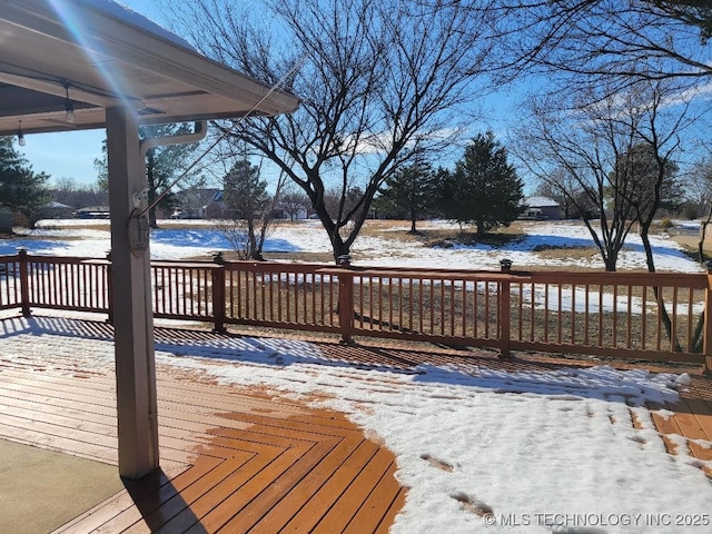 view of snow covered deck