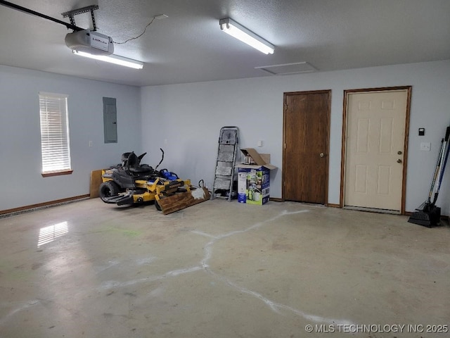 garage featuring a garage door opener and electric panel