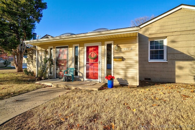 ranch-style house with a front yard