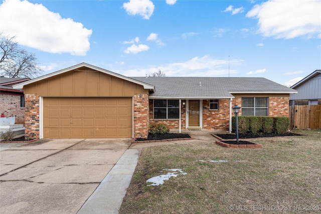 single story home with a front yard and a garage