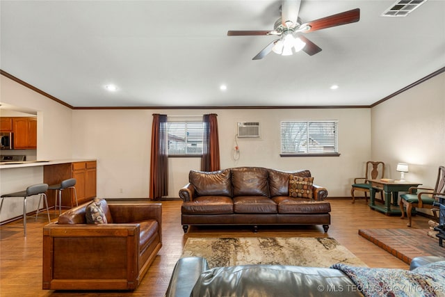 living room with a wall unit AC, ceiling fan, crown molding, and light hardwood / wood-style flooring