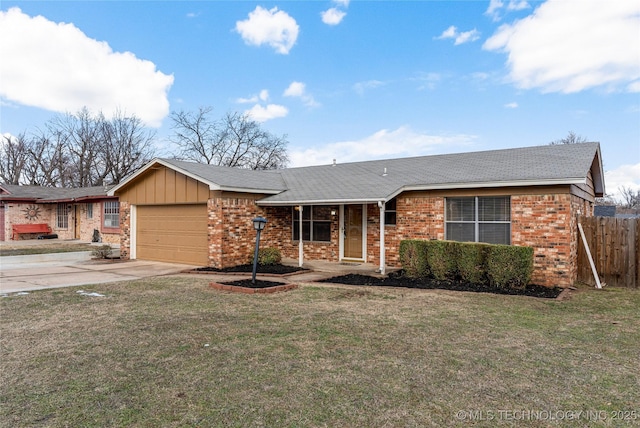 ranch-style house with a front yard and a garage