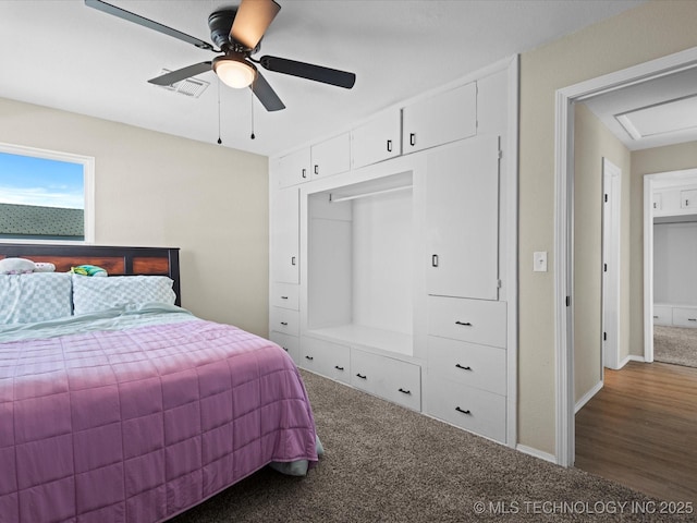 carpeted bedroom with baseboards and a ceiling fan