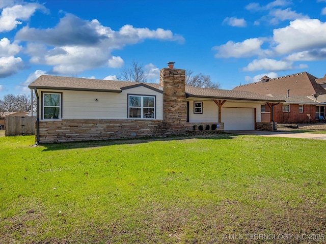 single story home featuring stone siding, an attached garage, a chimney, and a front yard