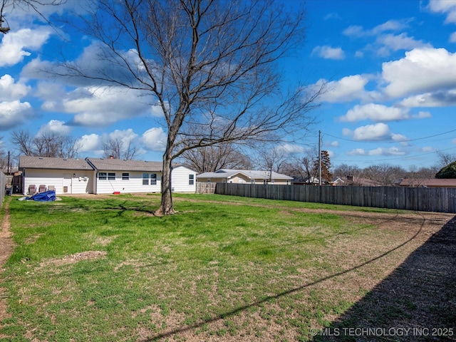 view of yard featuring fence