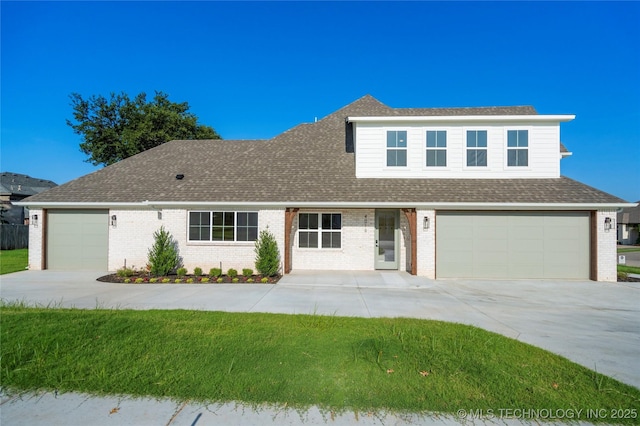 front of property with a front lawn and a garage