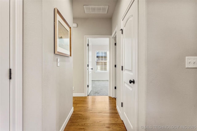 hallway featuring light wood-type flooring