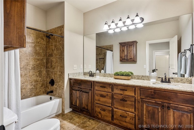 full bathroom with toilet, vanity, and shower / tub combo with curtain