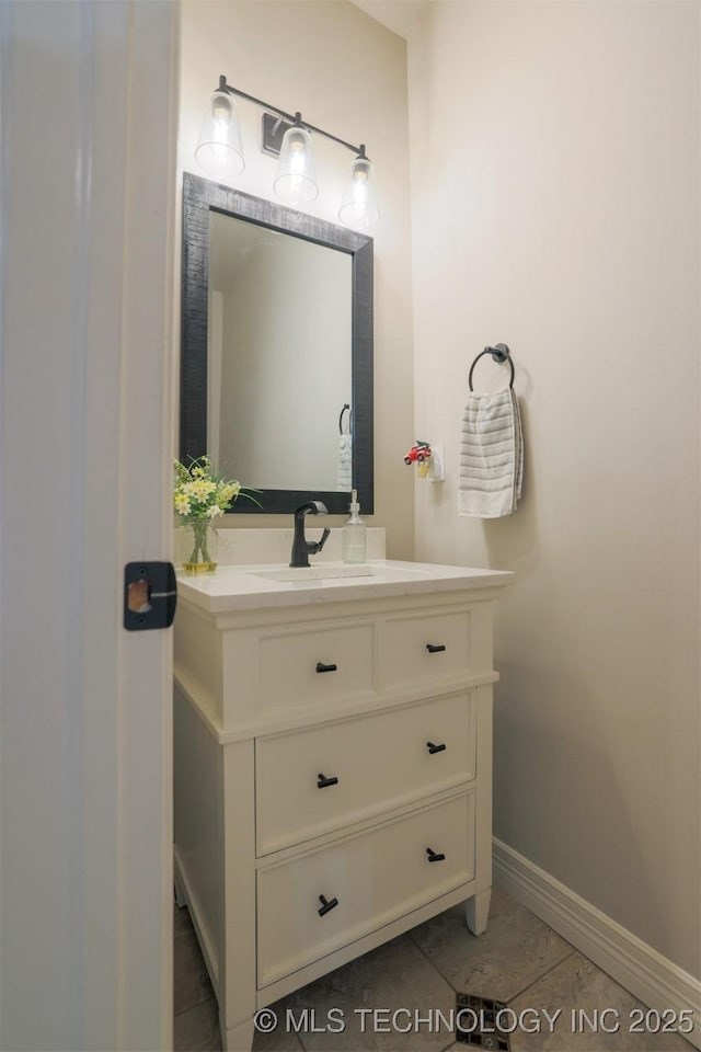 bathroom with vanity and tile patterned flooring