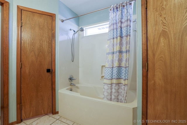 bathroom with tile patterned flooring and shower / tub combo with curtain