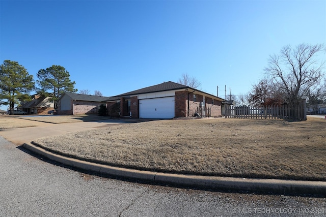 ranch-style home with a garage