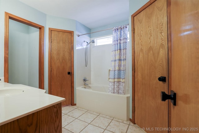 bathroom featuring shower / tub combo and vanity