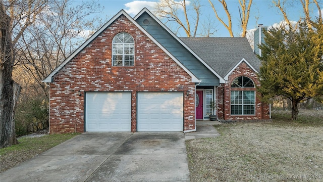 view of front property with a front yard and a garage