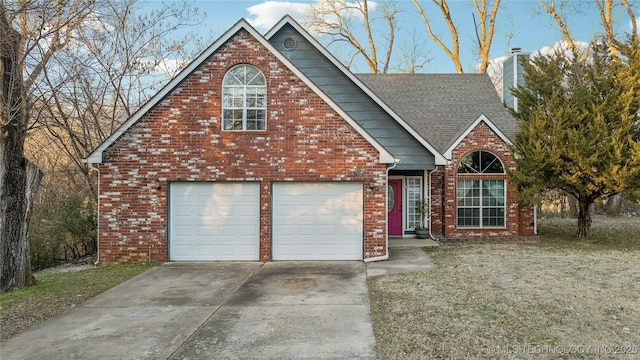 front of property with a front yard and a garage