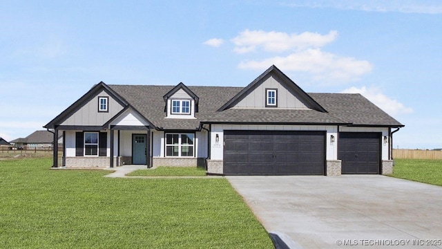 craftsman-style home featuring a garage and a front lawn