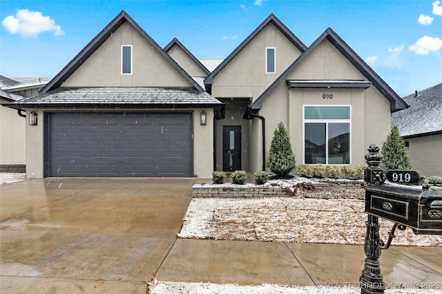 view of front of home with a garage